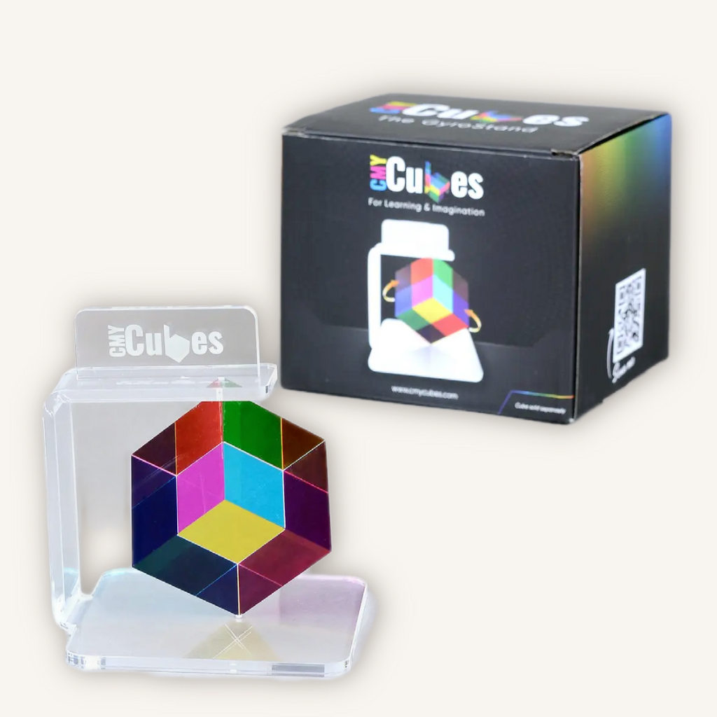 Official CMY Cubes GyroStand with retail packaging, a 360-degree spinning display stand designed for the Original 50mm CMY Cube.