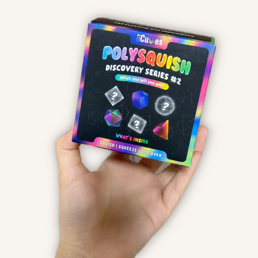 Official CMY Cubes PolySquish Mystery Series 2 box held in hand featuring collectible surprise sensory squishies and rare finds.