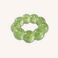 Green Feelzies Original Squishy Bracelet wearable sensory fidget toy with a soft squeezable texture for calming tactile play.