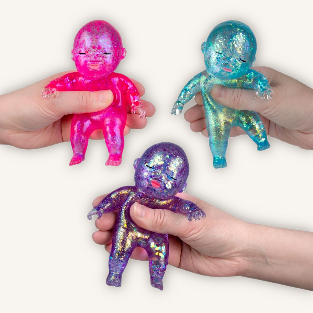 ORB Sugar Swaps Onesies glitter-filled sensory squishy characters shown in assorted colours for squeezing, fidgeting and collecting.