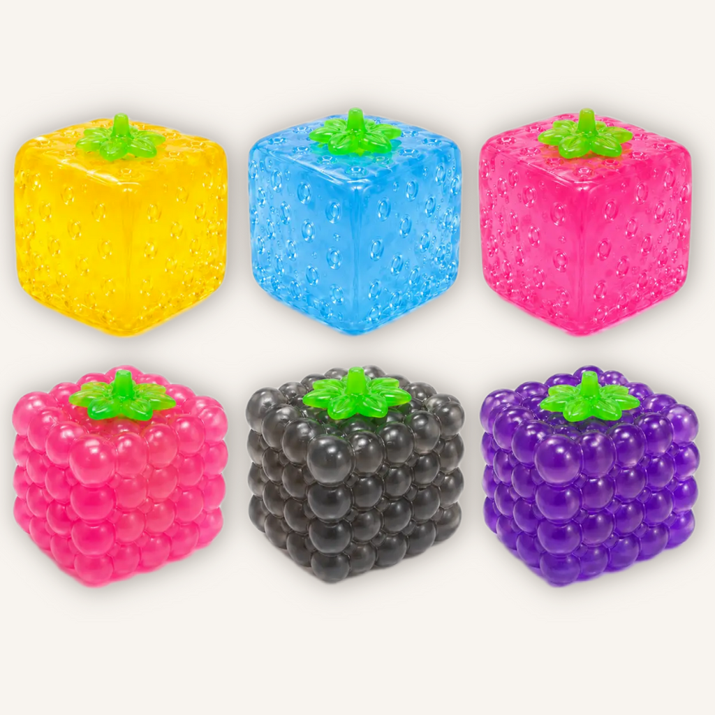 Official Top Trenz Super Duper Sugar Squisher Fruit Cubes shown in six colourful textured sensory squishy styles.