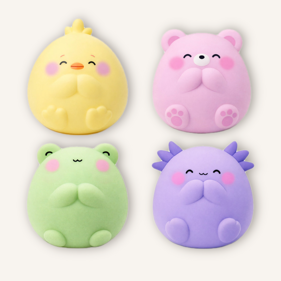 All four Top Trenz Butter Squishers Squishy Buns characters together including Gigi the Frog, Daisy the Chick, Angi the Axolotl, and Penny the Bear.